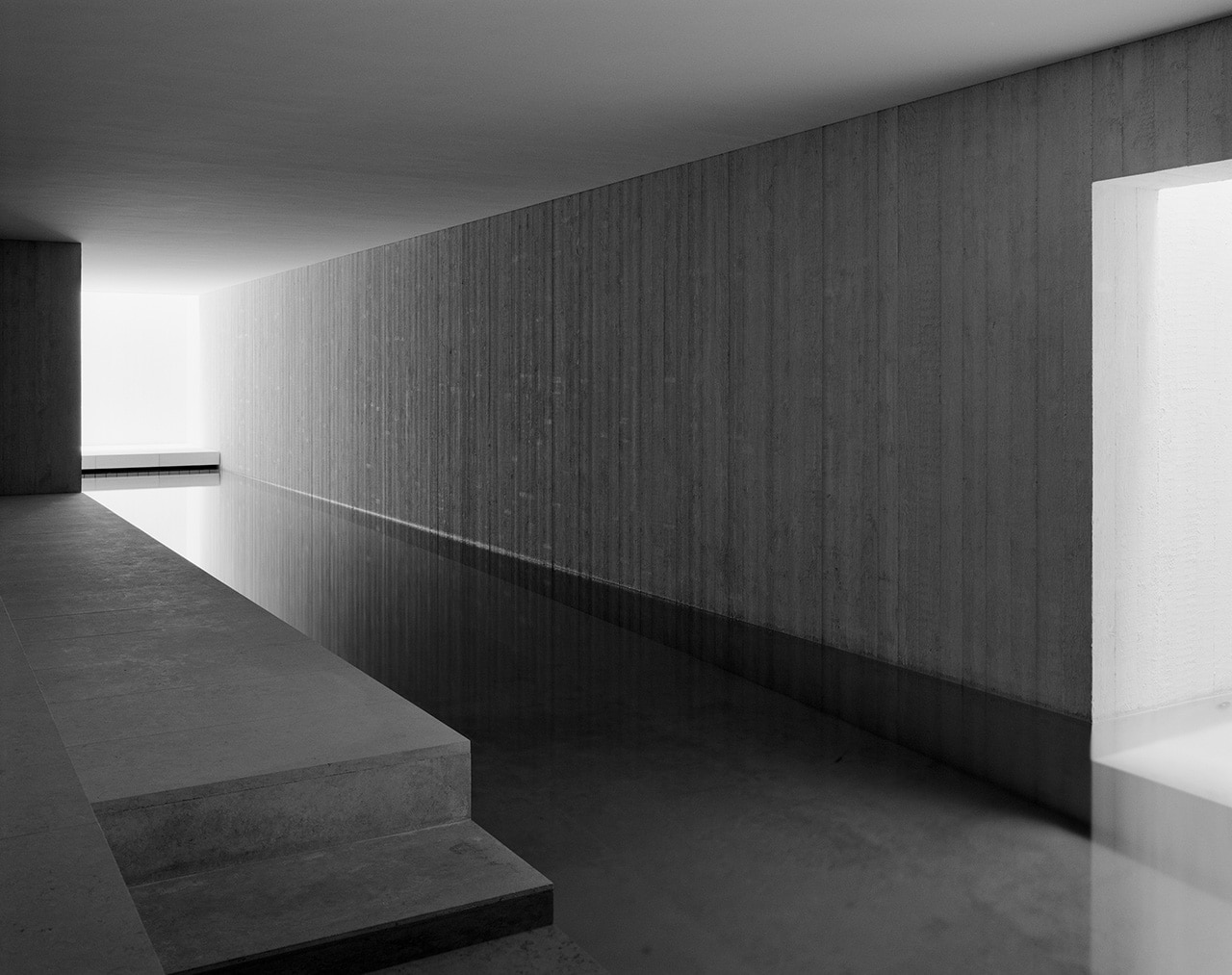 Netherlands. Russel Jones completes a sheer white concrete villa in a ...