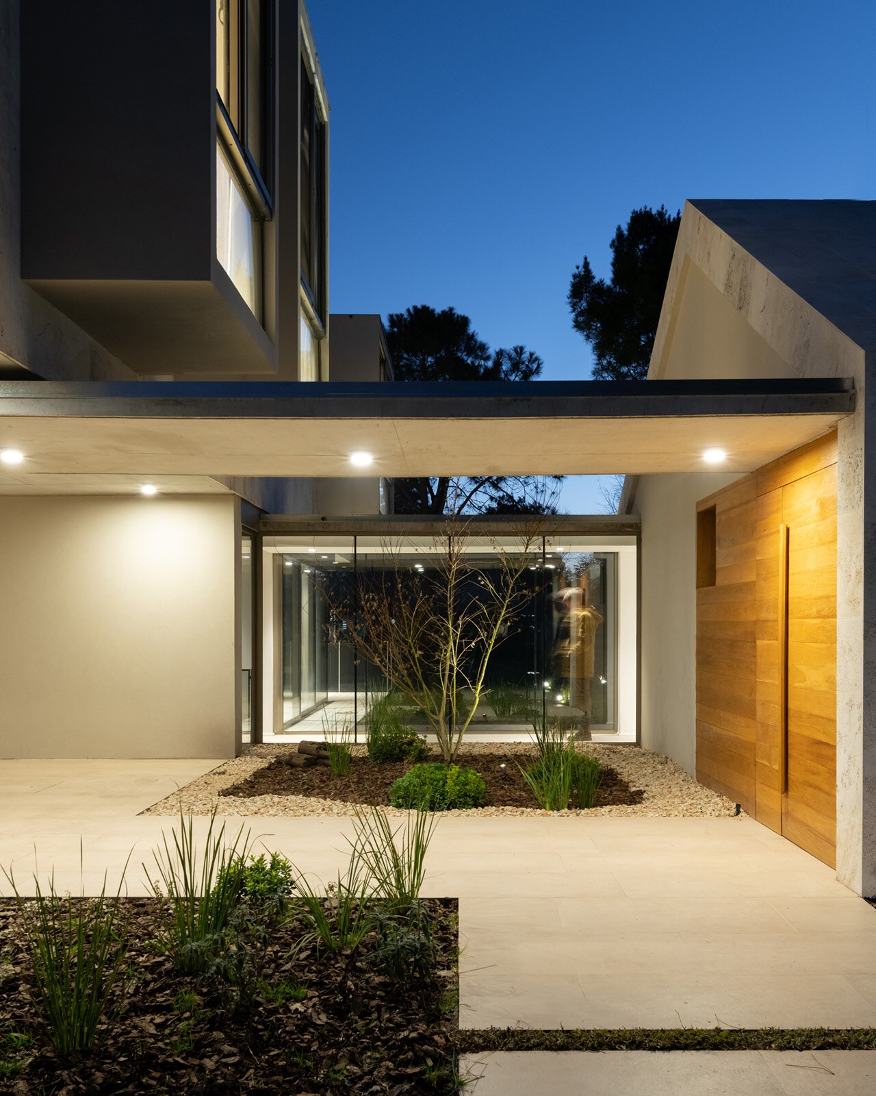 Argentina. A pitched-roof house cladded with marble - Domus