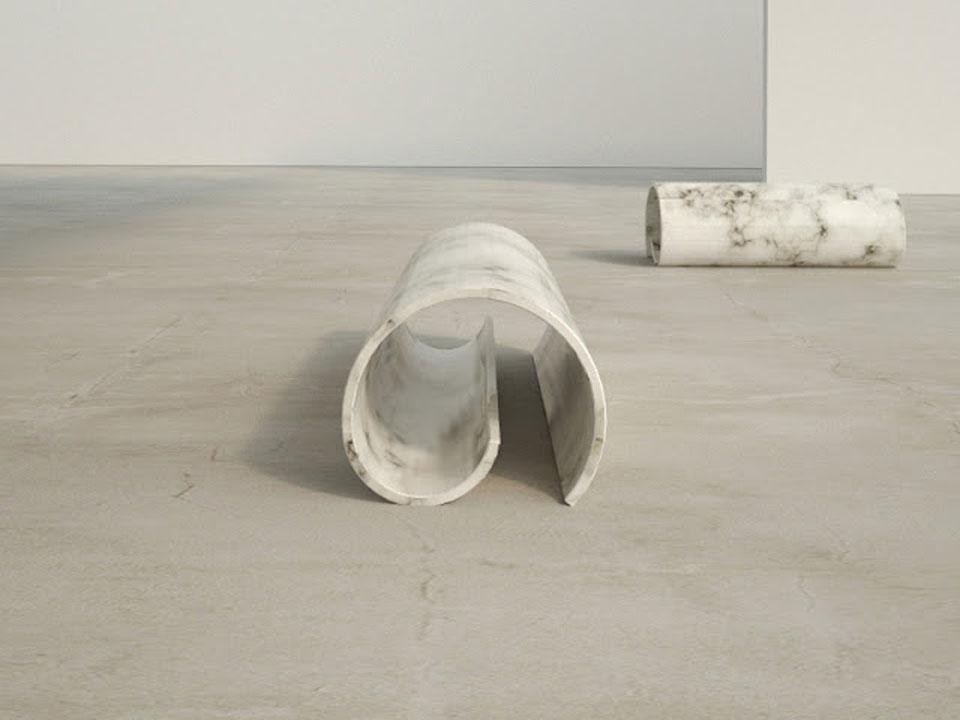 The <em>Girella</em> bench exemplifies Gilad's concept of lightness, applied to marble