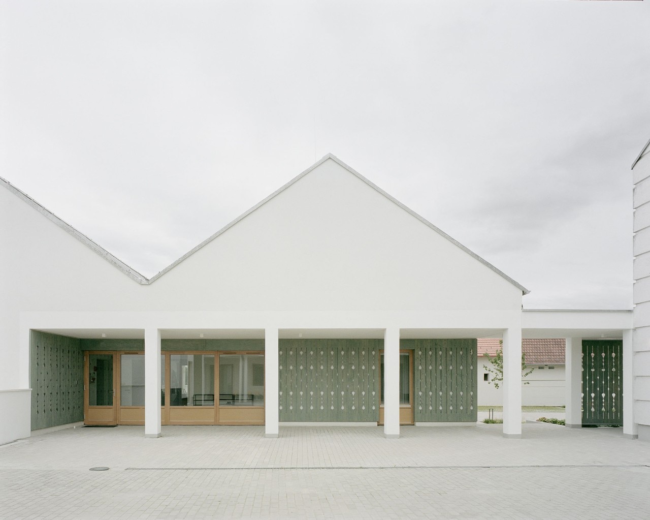 Kindergarten in The Churchyard by Archikon Architects in Zsámbék, Hungary