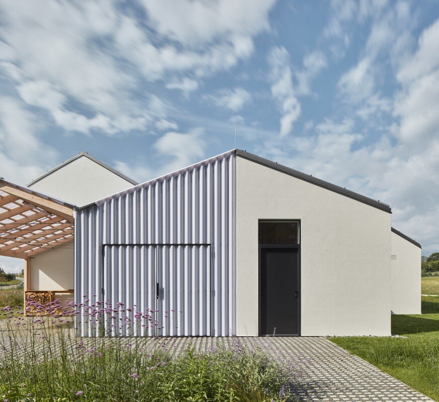 Pitched roofs for a three-generation house in the Bohemian fields