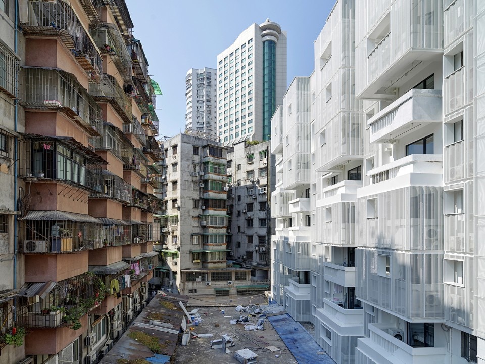 White facade nestles in Guangzhou’s rugged cityscape