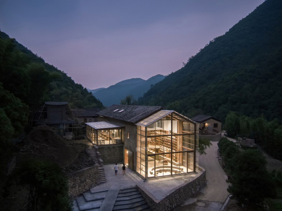Sleeping among the books of a library in an ancient village in China