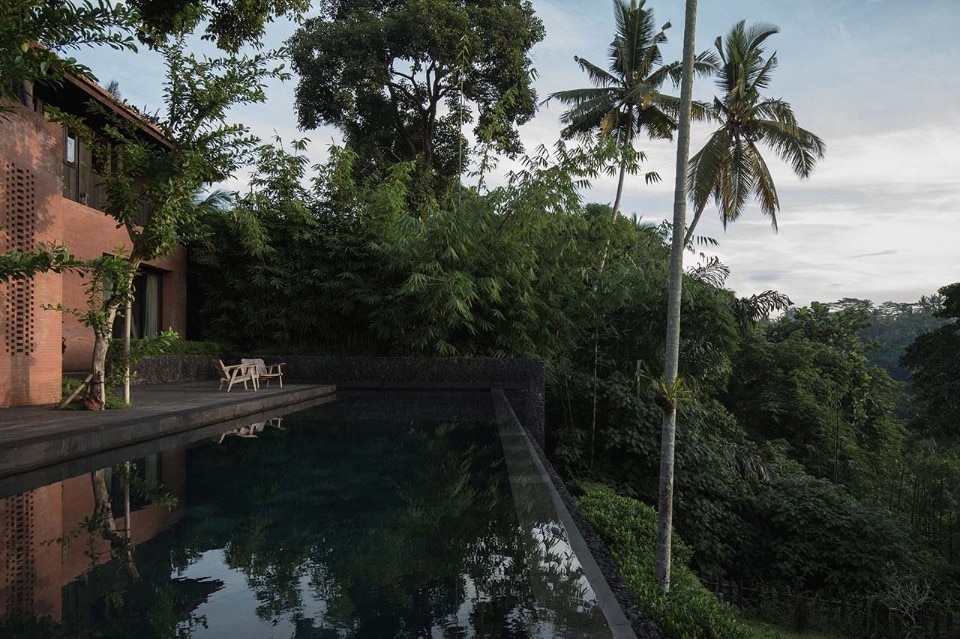 Bali. The texture of wood, stone and brick of a villa in the forest