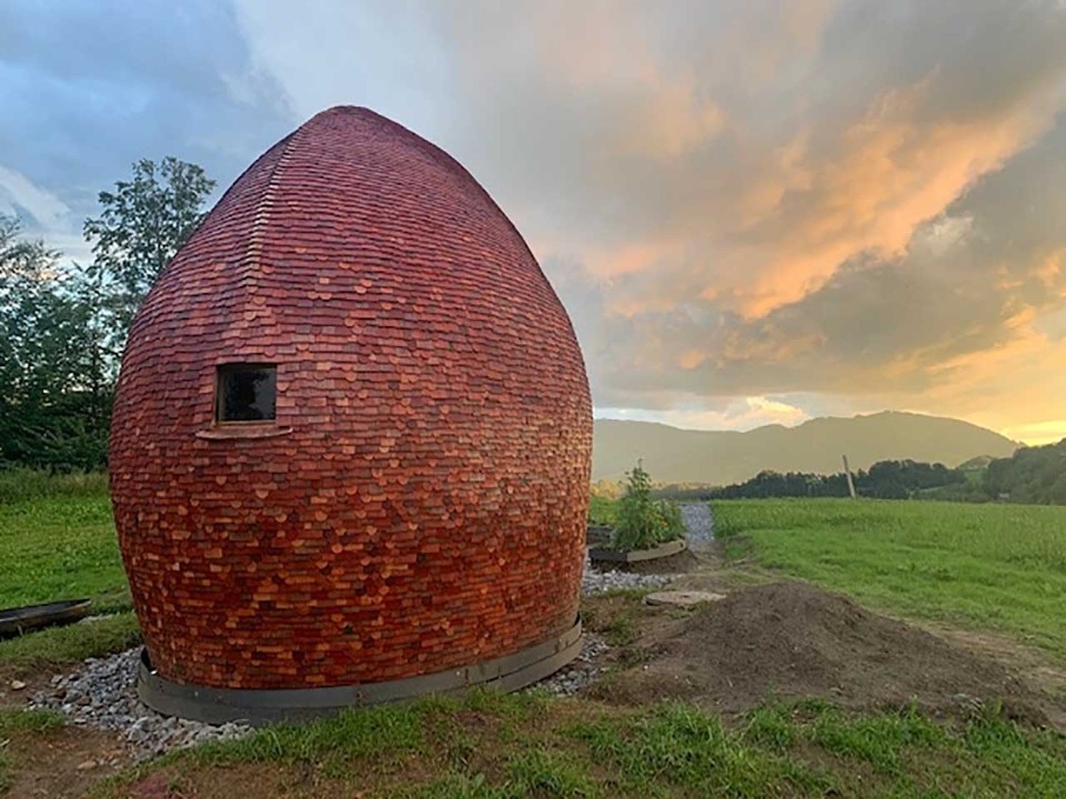 An alcove in raw earth commemorates the experience of birth