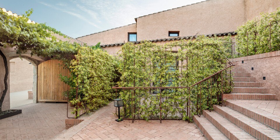 The outdoor renovation of an old farm in Catalonia