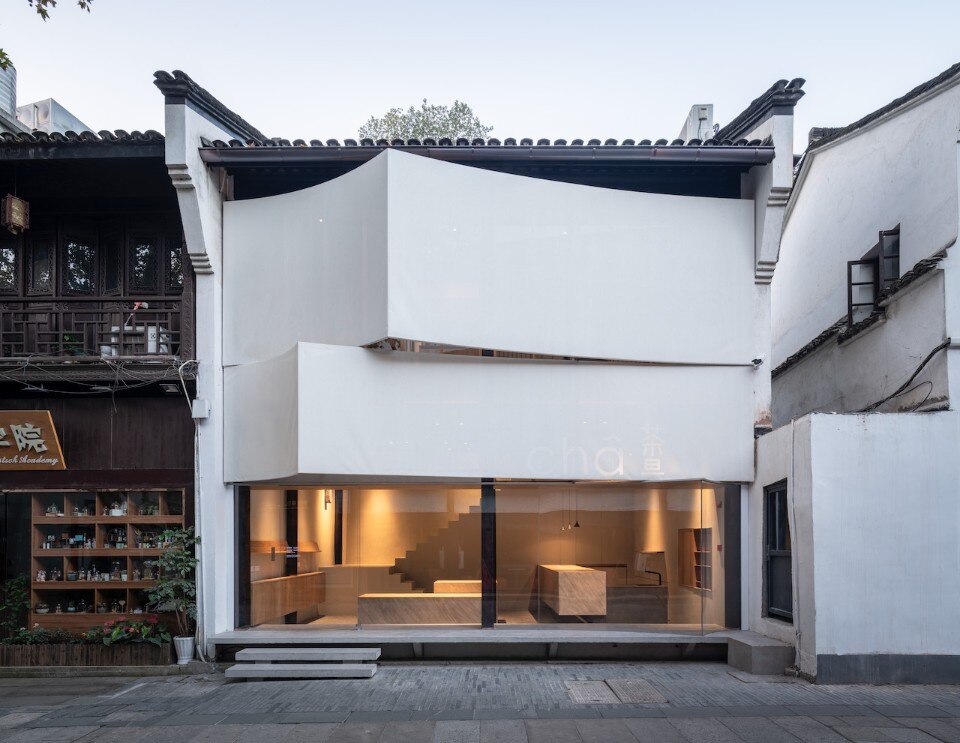 China, the facade of a tea house reminds of folded paper