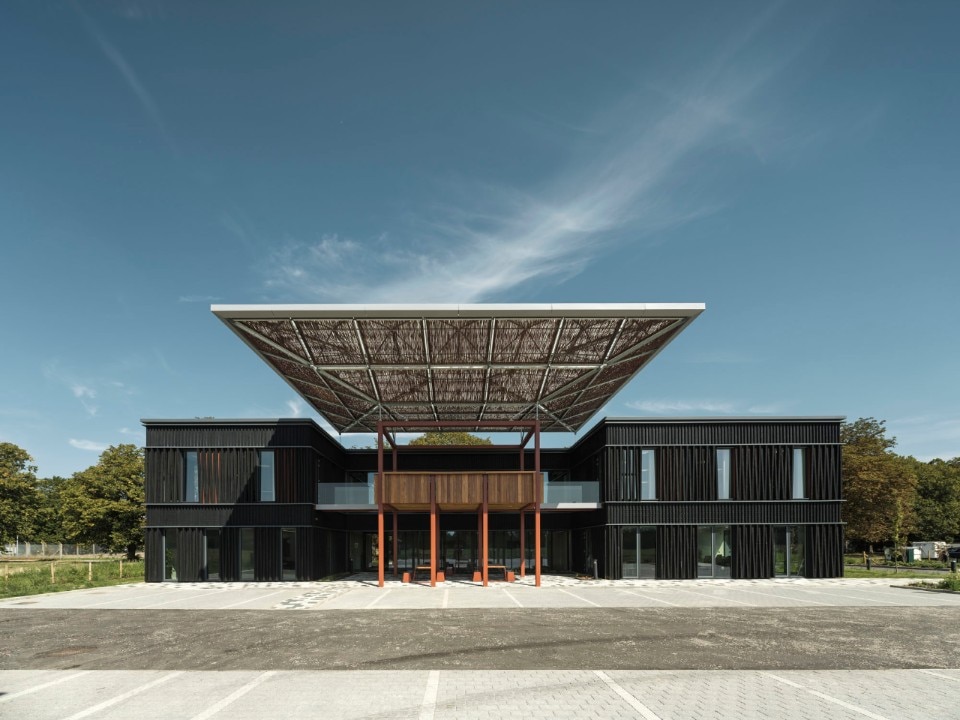 A building in balance between industrialization and rural barns