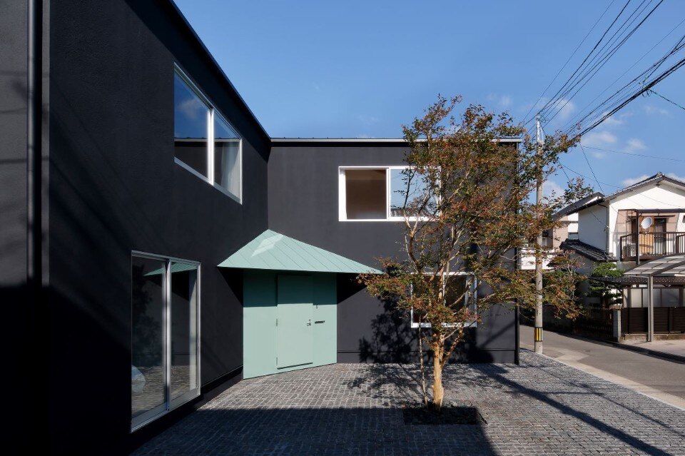 Japan, a symmetrical house surrounds a small courtyard
