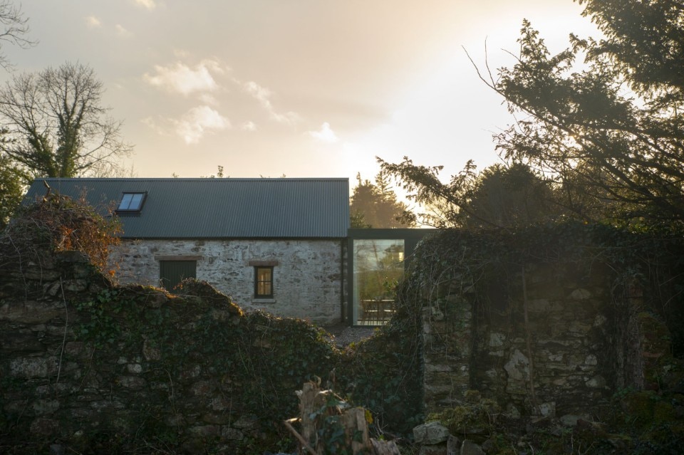 In Ireland, a cottage rises from the ruins