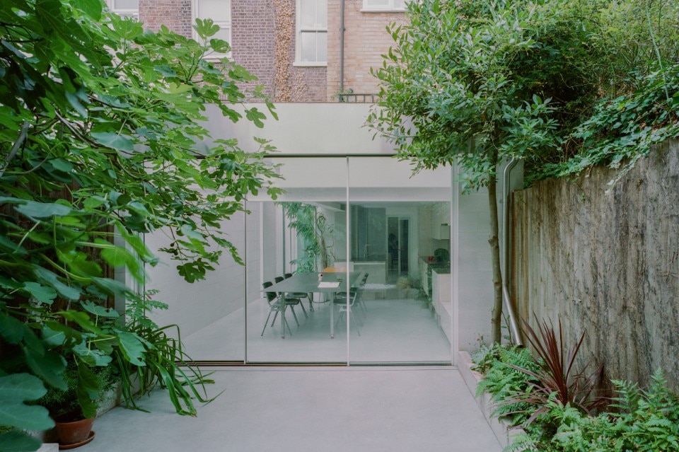 An urban oasis in London plays with transparency and natural light