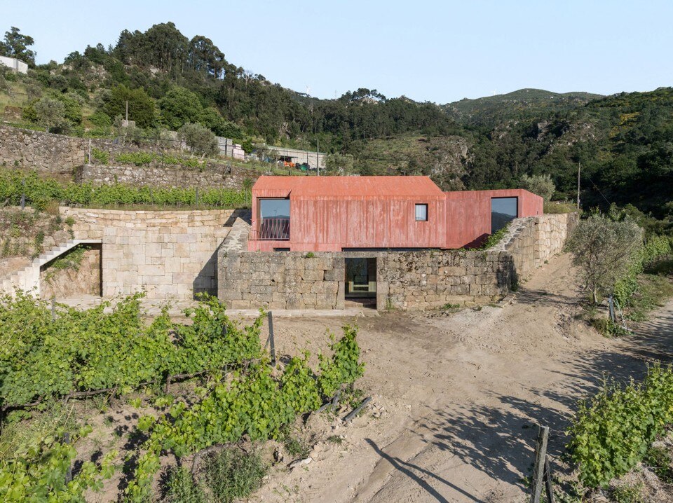 A house in the terraced hills of the Douro seems to grow out of the ground